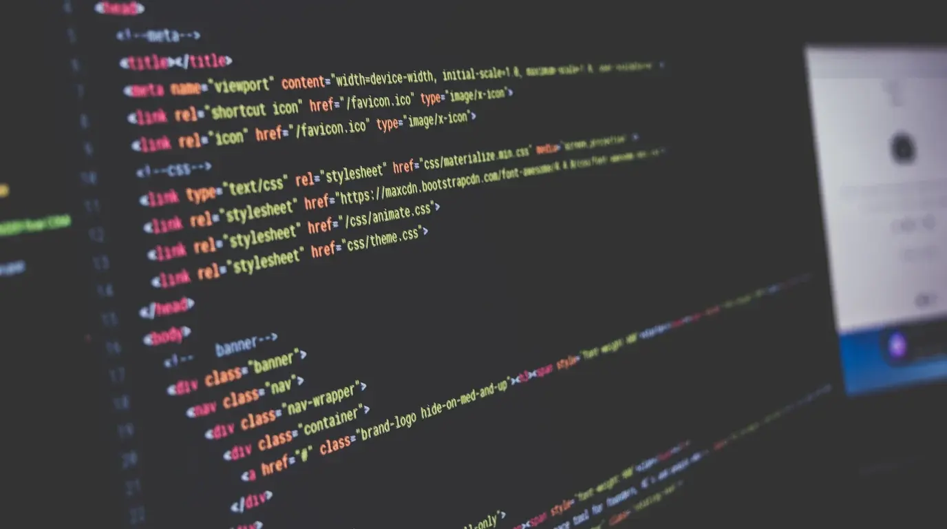 Lines of HTML markup in coloured syntax highlighting on a dark code-editor screen.